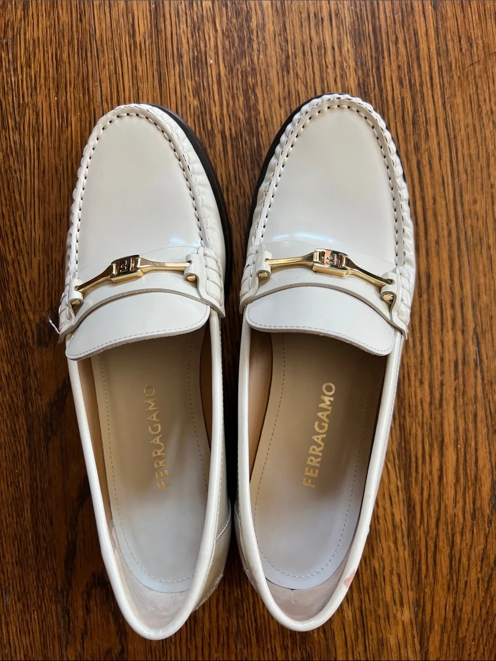 Ferragamo Ivory Patent Loafers with horse bit buckle detailing. Size 8. - Picture 2 of 11